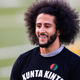 Colin Kaepernick looks on during his NFL workout held at Charles R Drew high school on November 16, 2019 in Riverdale, Georgia.